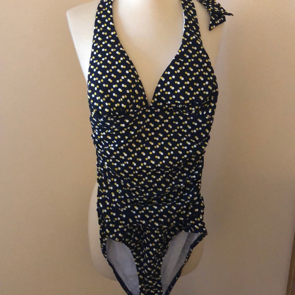 Polka dot barging suit one piece.